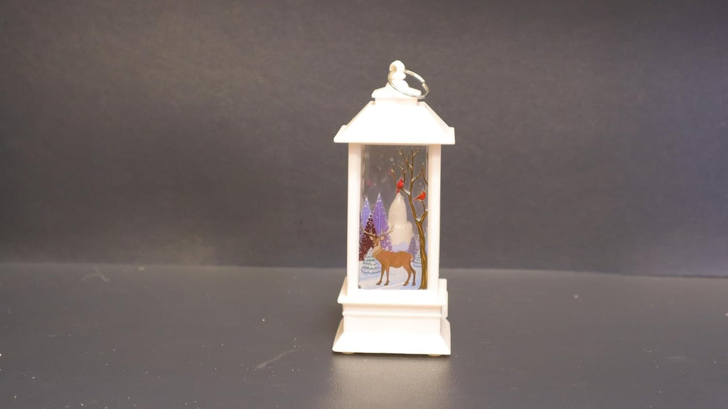 Christmas Decor Co. LED Christmas Lantern, White Metal Winter Scene with Reindeer, 14 x 6.5 cm, Battery Operated Holiday Decoration, Musical Snow Globe Style, Indoor Home Decor with Santa Design