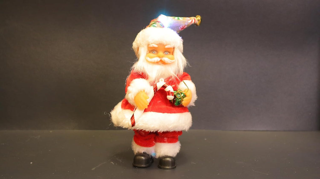 Musical Battery Operated Santa Claus Christmas Decoration, Red and White Plush Figure with Jingle Bell Music, 19 x 6 cm