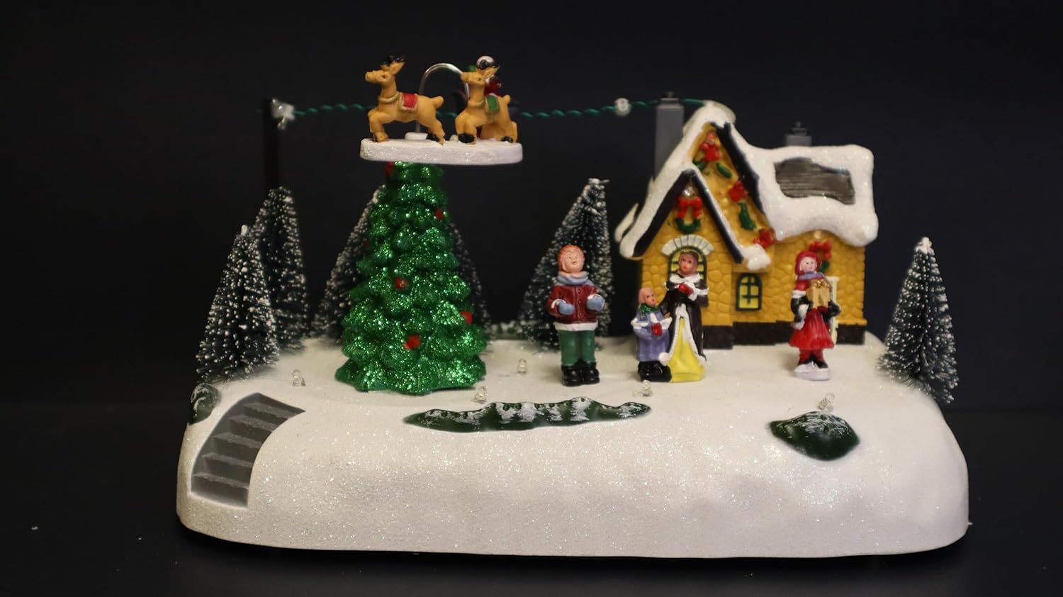 Christmas Village LED Musical Scene, 15 x 14 cm Illuminated Winter Display with Rotating Reindeer, Snow-Covered House, Christmas Trees, Holiday Figurines