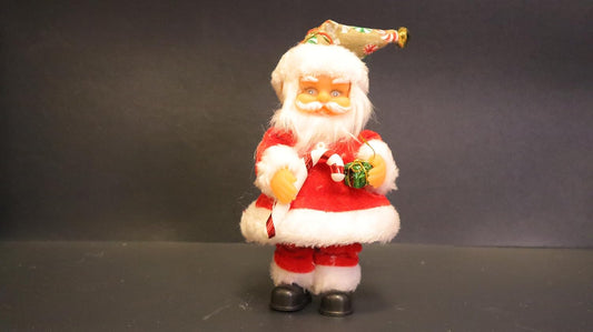 Musical Battery Operated Santa Claus Christmas Decoration, Red and White Plush Figure with Jingle Bell Music, 19 x 6 cm