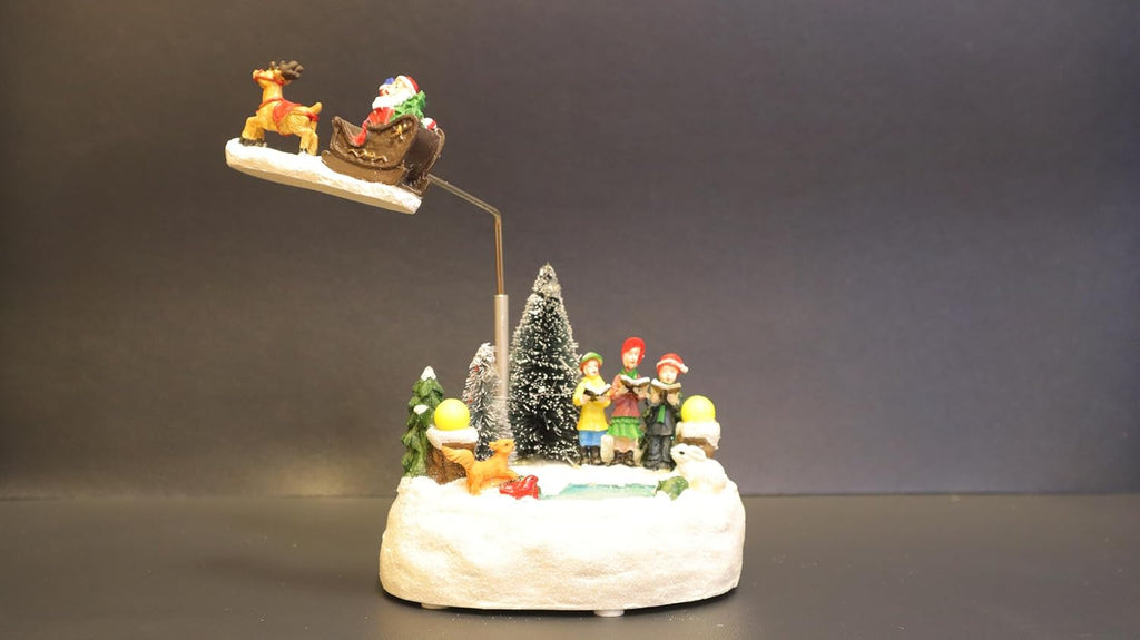 Animated Christmas Village Scene with Flying Santa Sleigh, Musical LED Winter Wonderland Decoration, Snow Base with Figurines, 13 x 11 x 20 cm